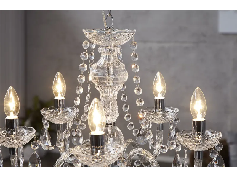 Lustre transparent suspendue  avec 5 bougies