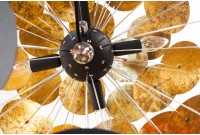 Lampe suspendue de design boule en métal coloris doré et noir