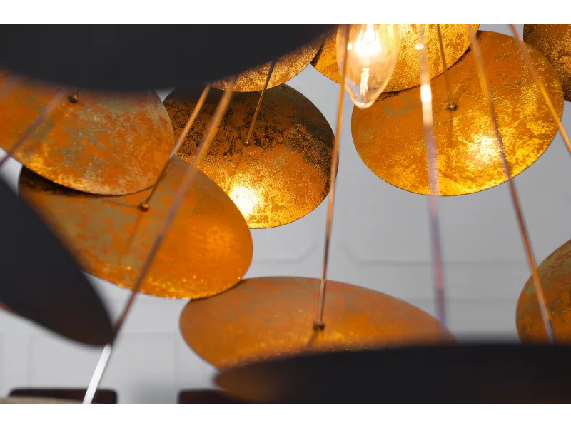 Lampe suspendue de design boule en métal coloris doré et noir