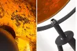 Lampadaire trépied design en acier inoxydable et en aluminium coloris noir et or