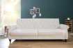 Canapé convertible design classique de couleur beige en tissu avec ...