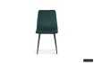 Chaise design en velours coloris vert, pieds noirs
