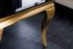 Table basse en verre noir et piètement doré de style baroque 100 cm